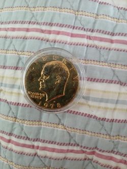 Gold-plated $1 Ike Dollar