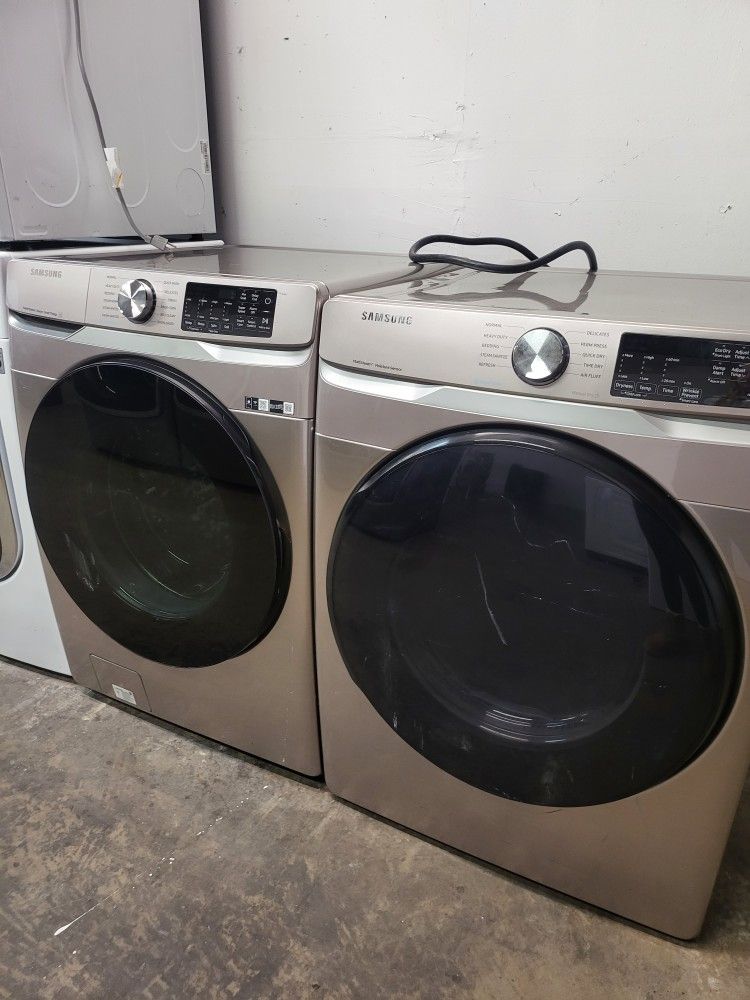 SAMSUNG SET STEAM WASHER AND ELECTRIC DRYER