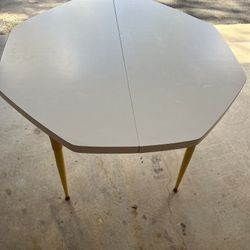 White Table  has 1 Leaf and Sunshine Yellow Legs