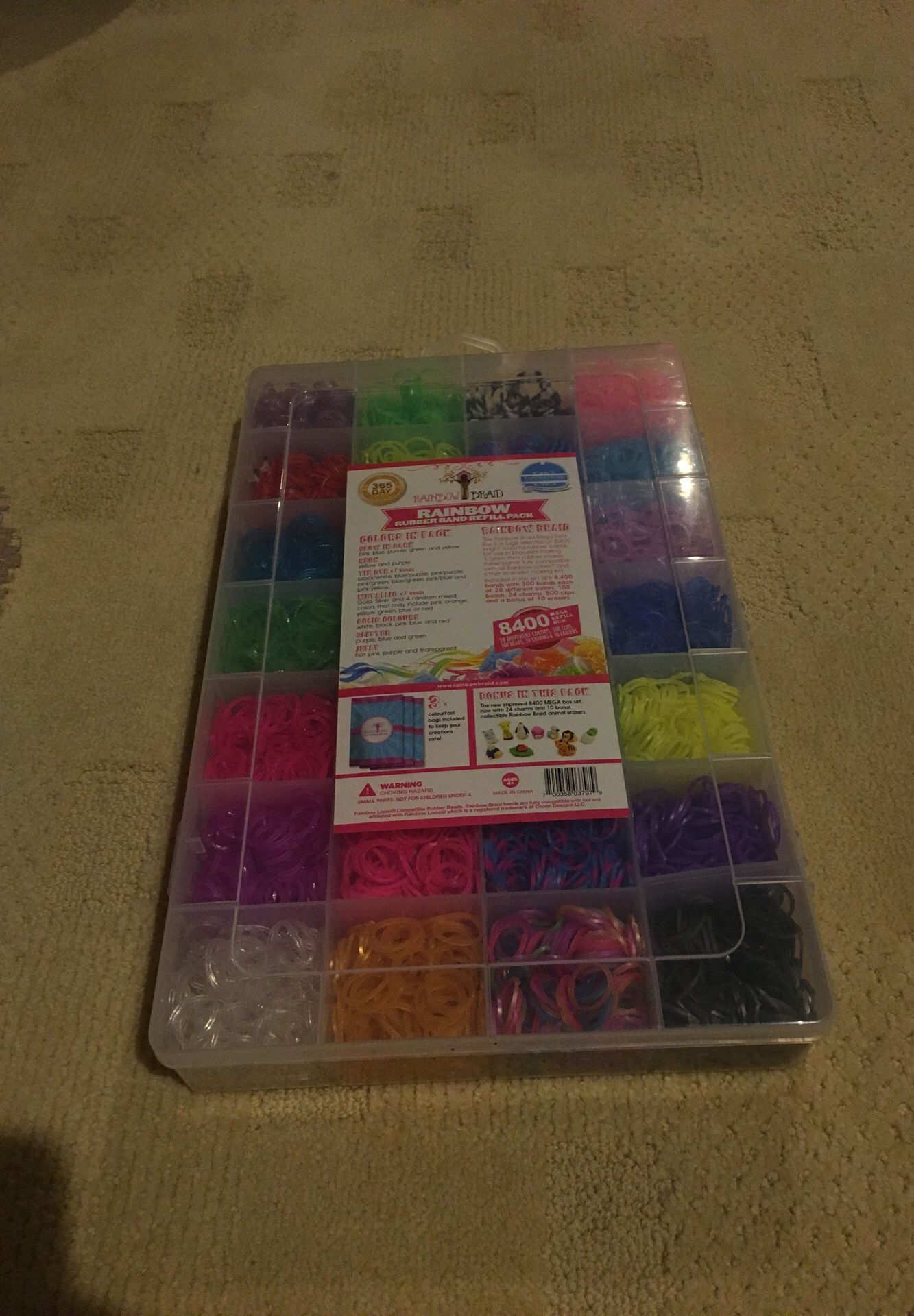 Rainbow loom rubber bands with guide to make bracelets