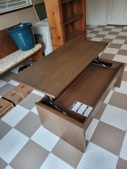 Coffee table with lift top