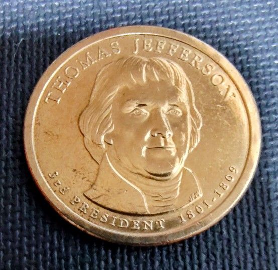 2 Presidential Gold Tone Coins Thomas Jefferson & James Monroe in good Circulated Condition.