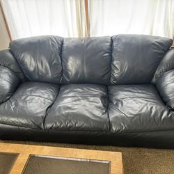 Over-stuffed Leather Couch And Love Seat