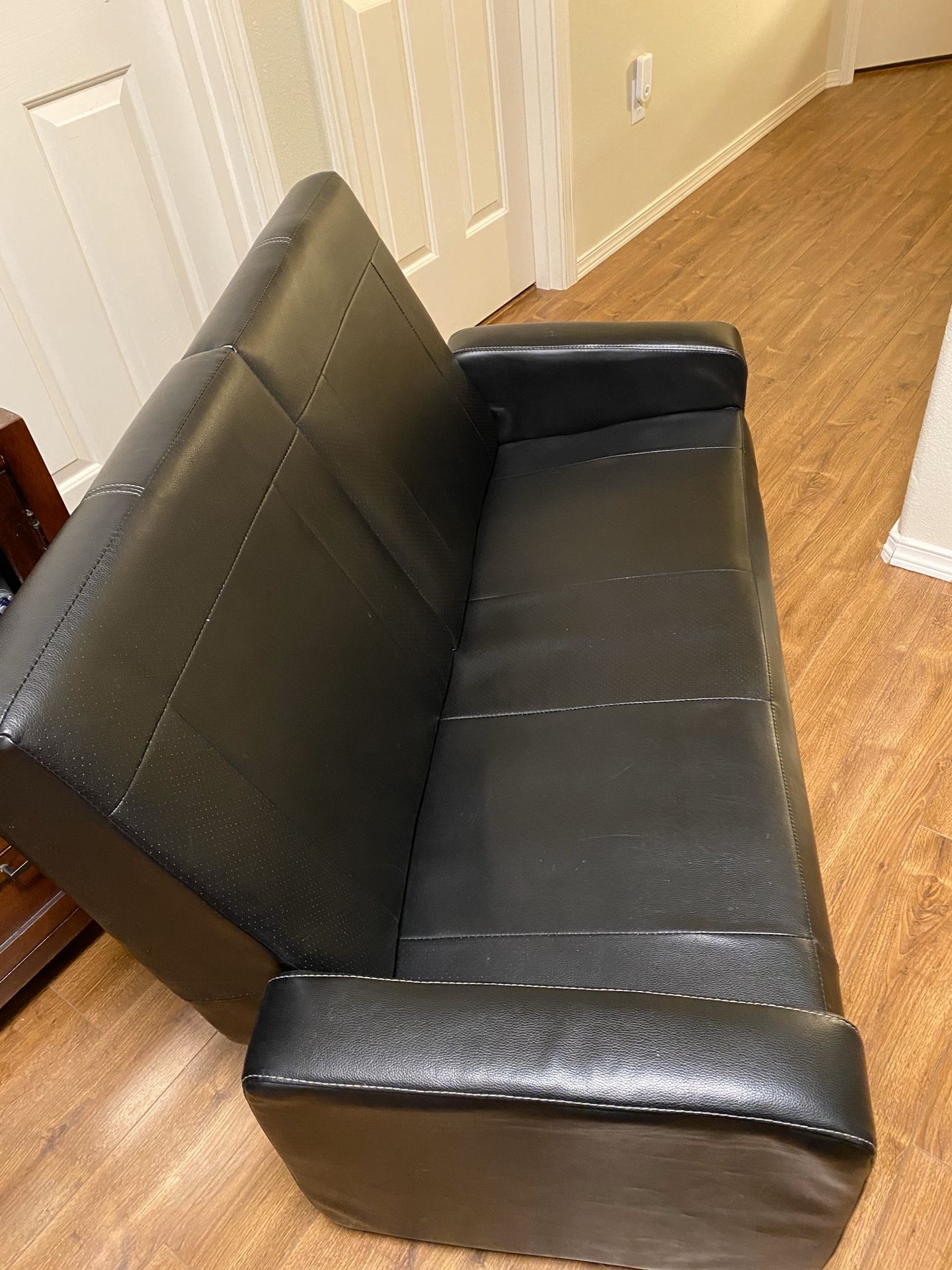 Leather loveseat storage bench