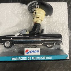 Mariachi’s bobble head, Lowrider