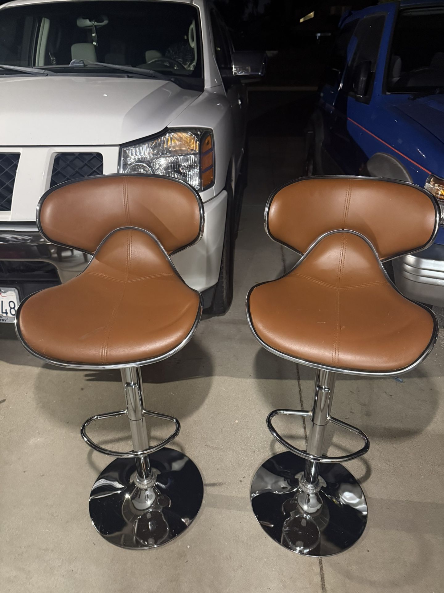 Two leatherette Airlift Adjustable Swivel Barstool