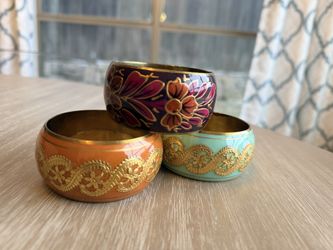 3 wide enameled brass floral bangle bracelets. $30 for All