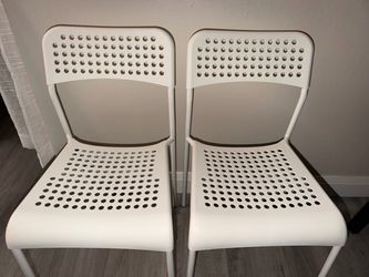 2 White Chairs