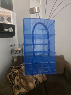 Mesh rack for drying herbs.