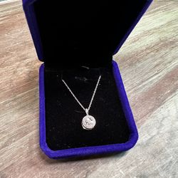 Classic versatile round diamond pendant necklace set in sterling silver 1/10 carat 