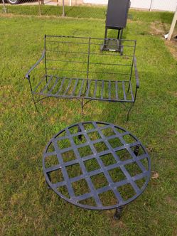 Heavy duty wrought iron bench and mild duty table for it