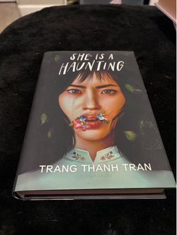 she is haunting book like new