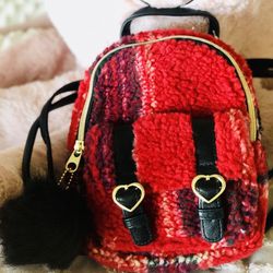 Girls plaid Sherpa mini backpack . new with tags. Girls love them! Brundage and Chester. Check out my other listings. 7.5” W x 9” H x 2” D. 