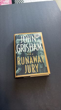 John Grisham the runaway Jury . Hard cover used, good condition .