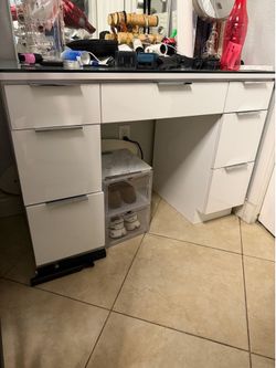 Custom makeup desk with drawers and protective glass vanity