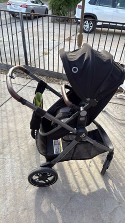 Maxi cosi black and green baby stroller