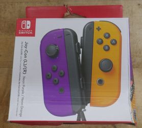 New Nintendo Switch Joy-Cons Pair Controller 112652D Neon Purple/Neon Orange. F(contact info removed)4.