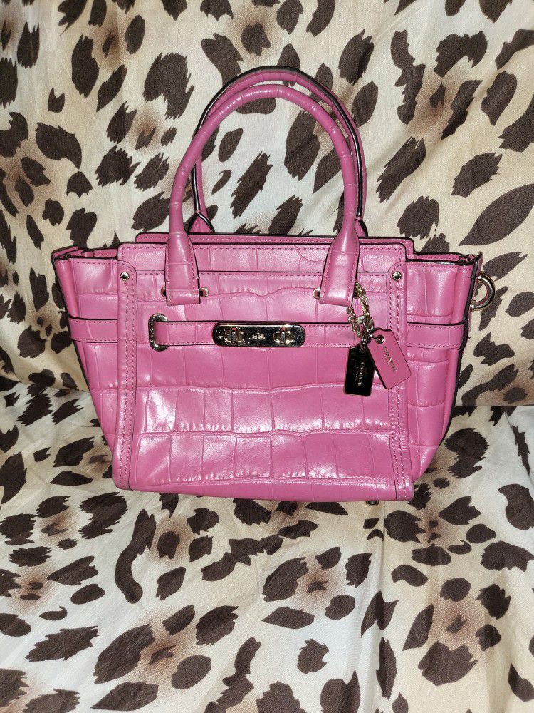 Coach signature handbag with pink and white stripe for Sale in Chandler, AZ  - OfferUp