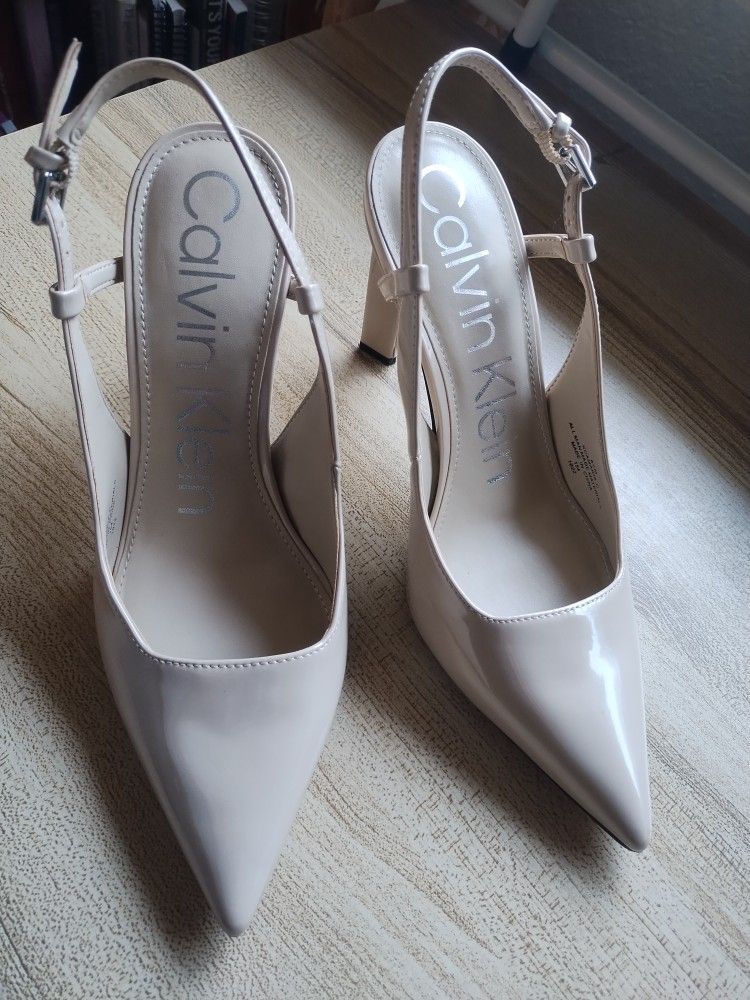 Calvin Klein Women's Amaria Wheeled Heel Shoe