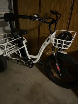 Beautiful white electric tricycle for sale.