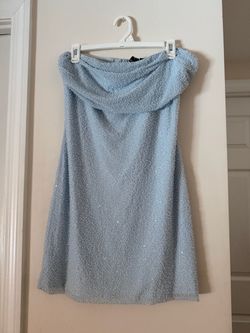 Light blue mini dress, with pearl/bead details.