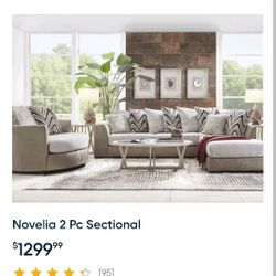 Novelia 2 Piece Sectional With Pillows
