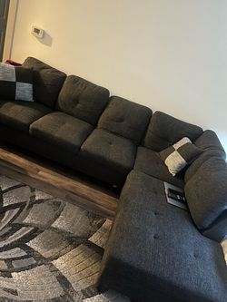 Sectional couch with ottoman