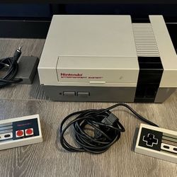Vintage Original Nintendo Nes System With Accessories, Running Pads And Games