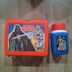 vintage Thermos brand Star Wars lunch box, likely from 1977, featuring iconic characters like Darth Vader, C-3PO, and R2-D2