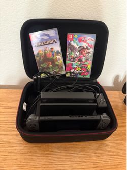 Nintendo Switch with 2 games