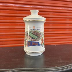 Vintage 1972 University Of Illinois Old Fitzgerald Whiskey Decanter is a unique and collectible piece of distillery memorabilia. 