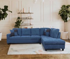 Blue microfiber sectional couch and ottoman