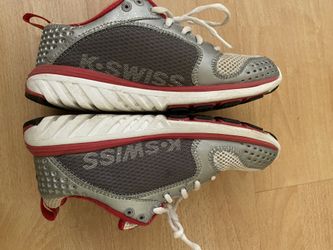 Gray and red K-Swiss athletic shoes in good condition.