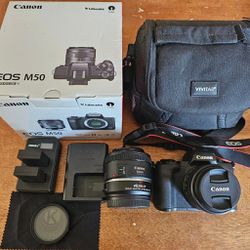  Canon EOS M50 Mirrorless Camera with EF-M 15-45mm kit lens + EF 50mm f1.8
