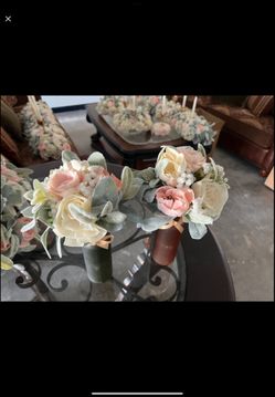 Wedding aisle bouquets and metal arch backdrop stands