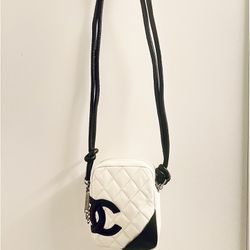 Classic black and white with this Chanel Cambon Crossbody Bag.