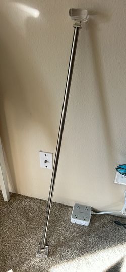 Curtain rod with clear finials and brackets