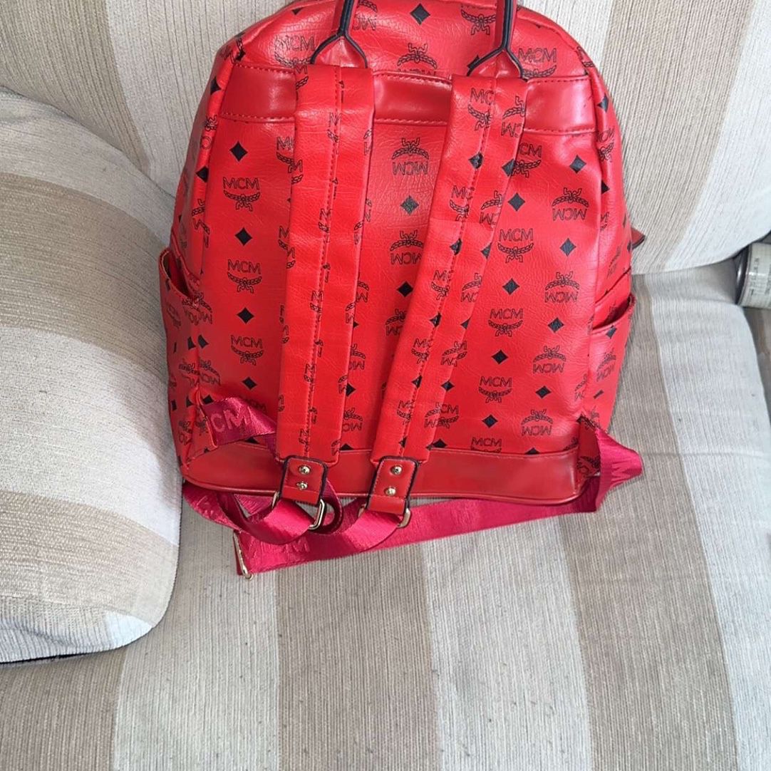 real red mcm backpack