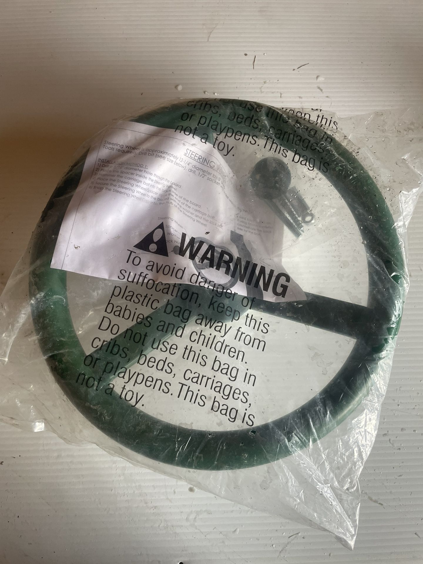 Green and Yellow Plastic Steering Wheels