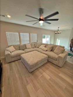 Large Cream Corduroy Sectional Sofa with Ottoman
