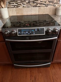 Samsung black stainless duo flex range