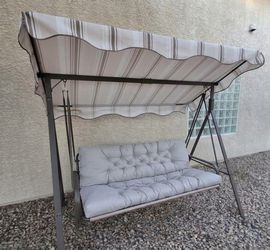 Outdoor swing with canopy
