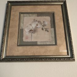 Gold Frame Picture With White Flower