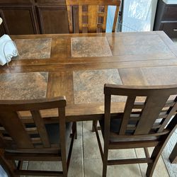 Dining table plus three chairs