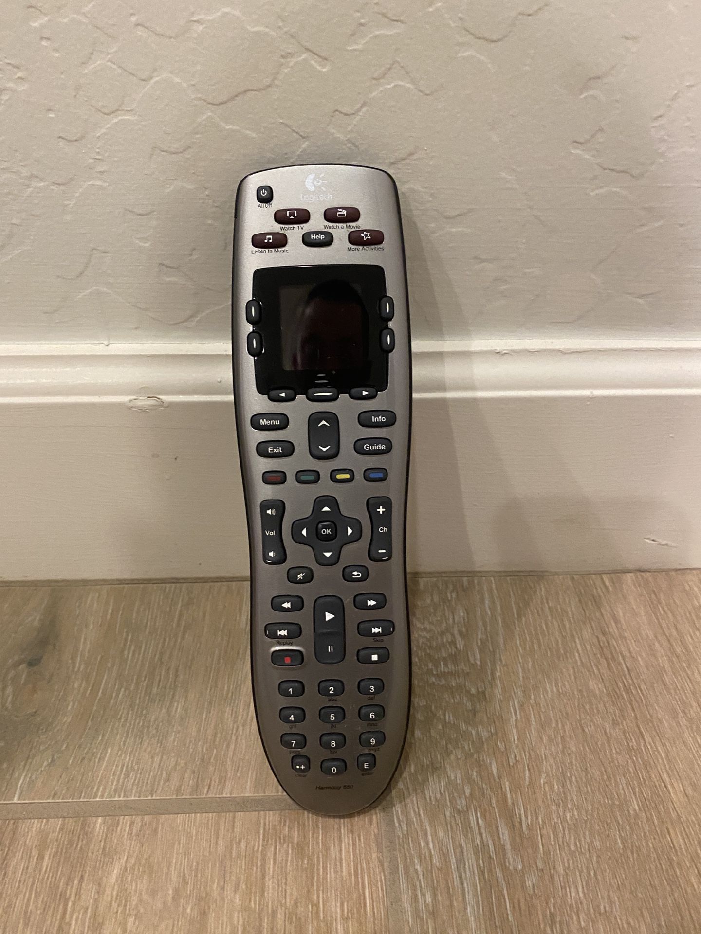 Logitech Harmony 650 a infrared all in one remote control.