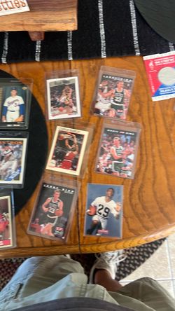 Collection of cards. Baseball ,basketball, one football card, Olympic cards and coins.