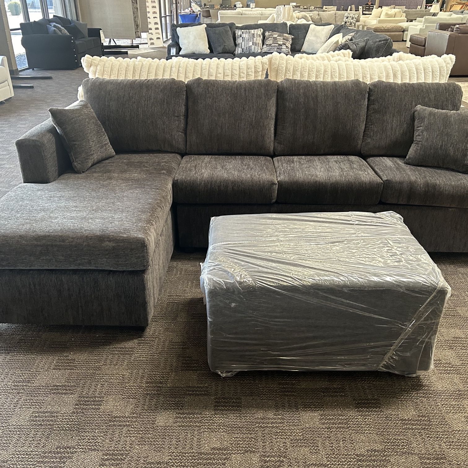 New Grey Sectional And Ottoman