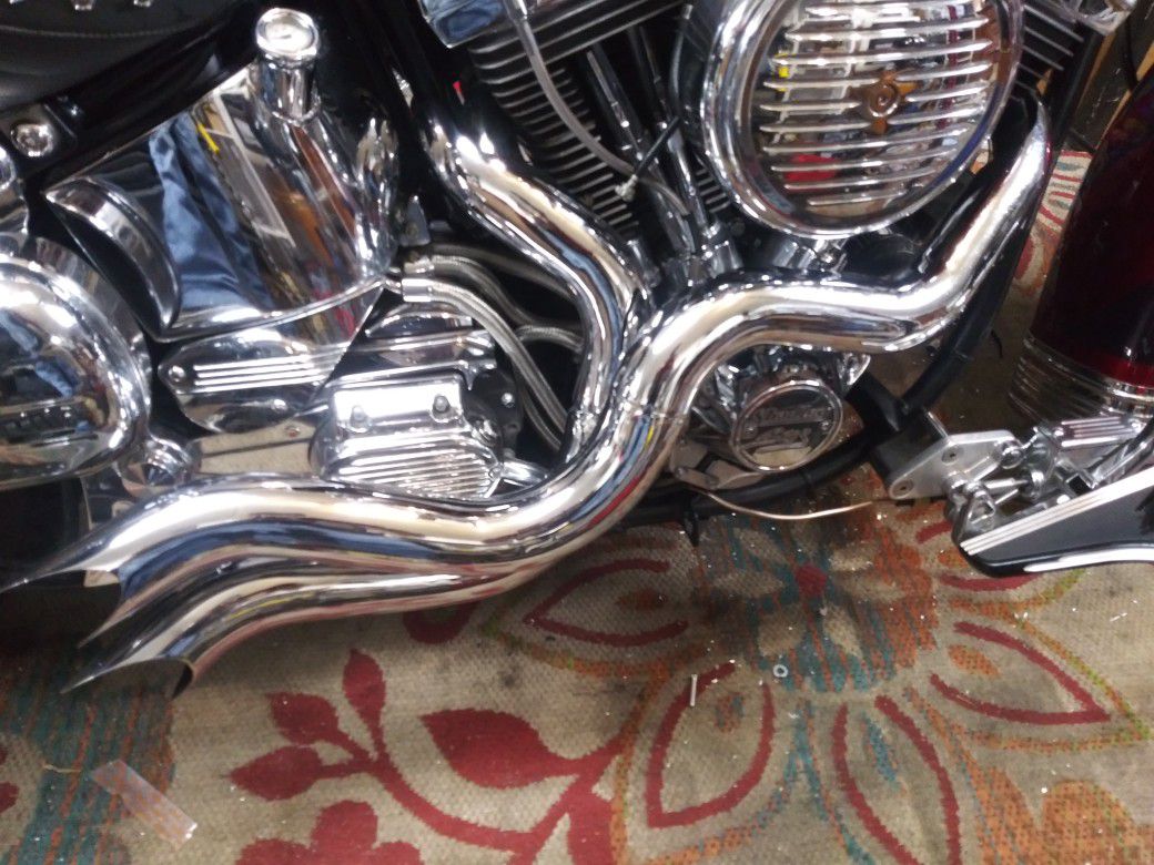 Photo Harley exhaust. Several sets of like new VanceHines and new set of custom Harley exhaust. $200 to $350 Chose a set and make an offer. Txt Dan. To