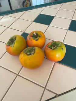 Large Organic sweet persimmons.