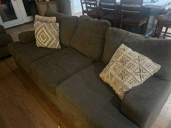 Two 3 seater Couches  with cushions